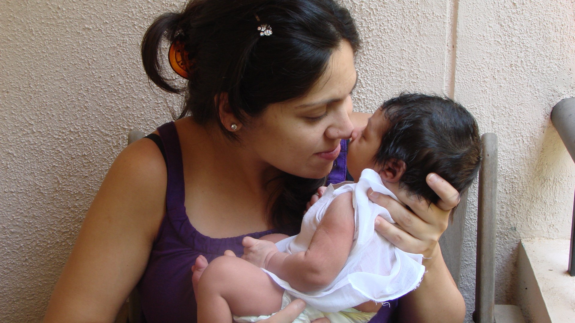 A collage of Bangalore Birth Network's work with mothers and babies
