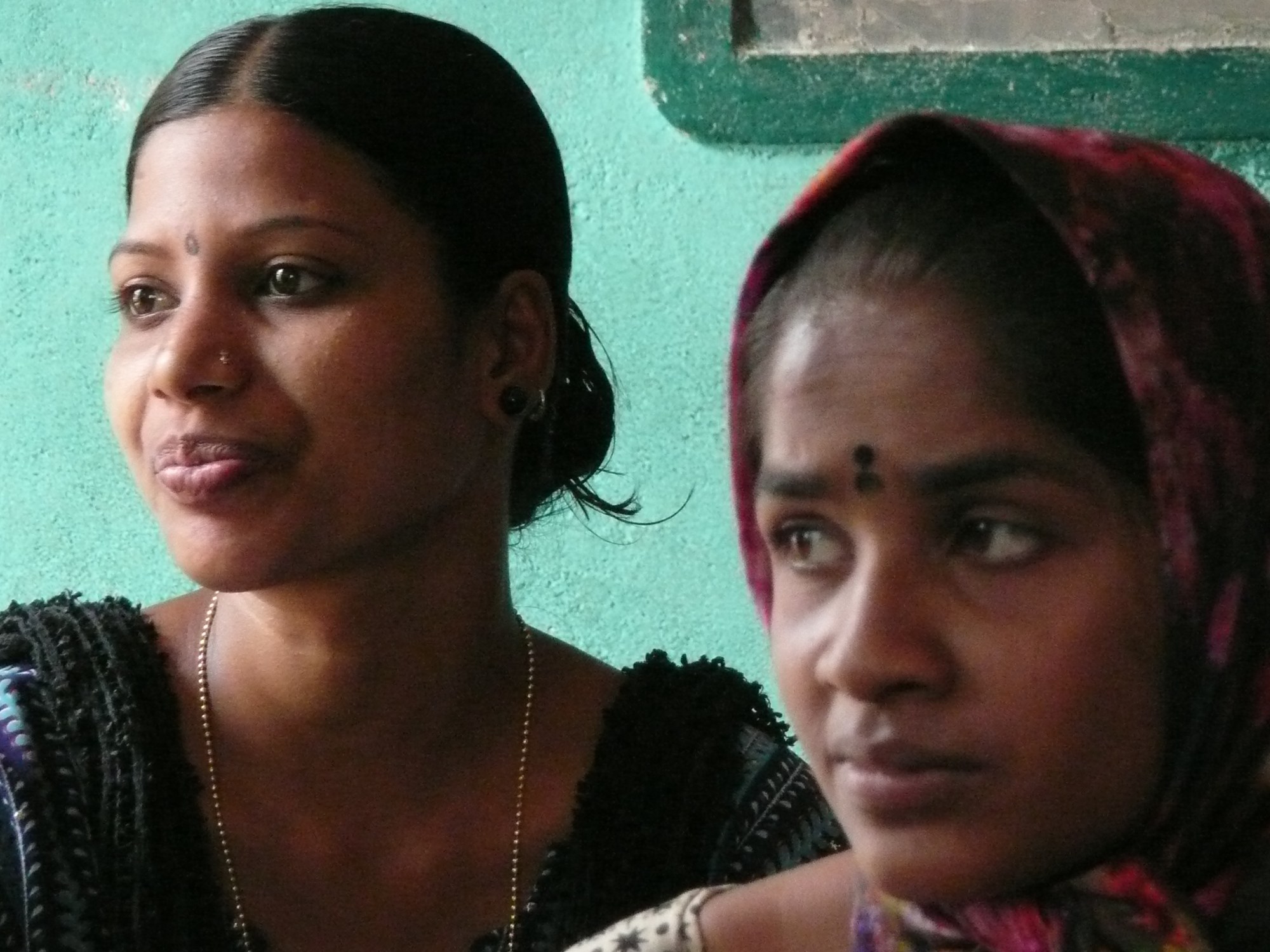 Two women in conversation during a community health visit
