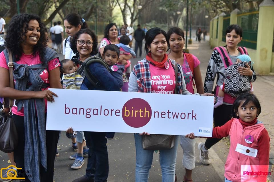 Volunteers carrying the Bangalore Birth Network banner through the city